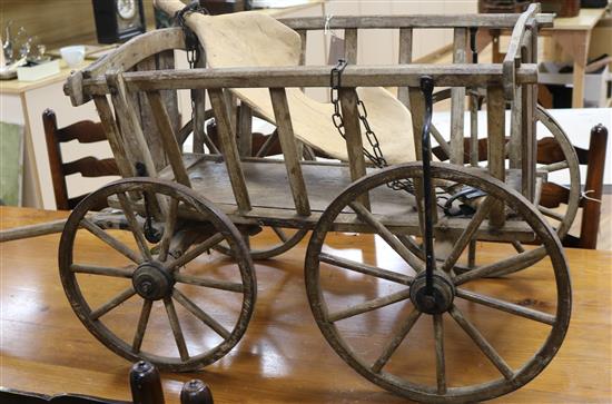 A German wood hand cart and yoke W.50cm approx.